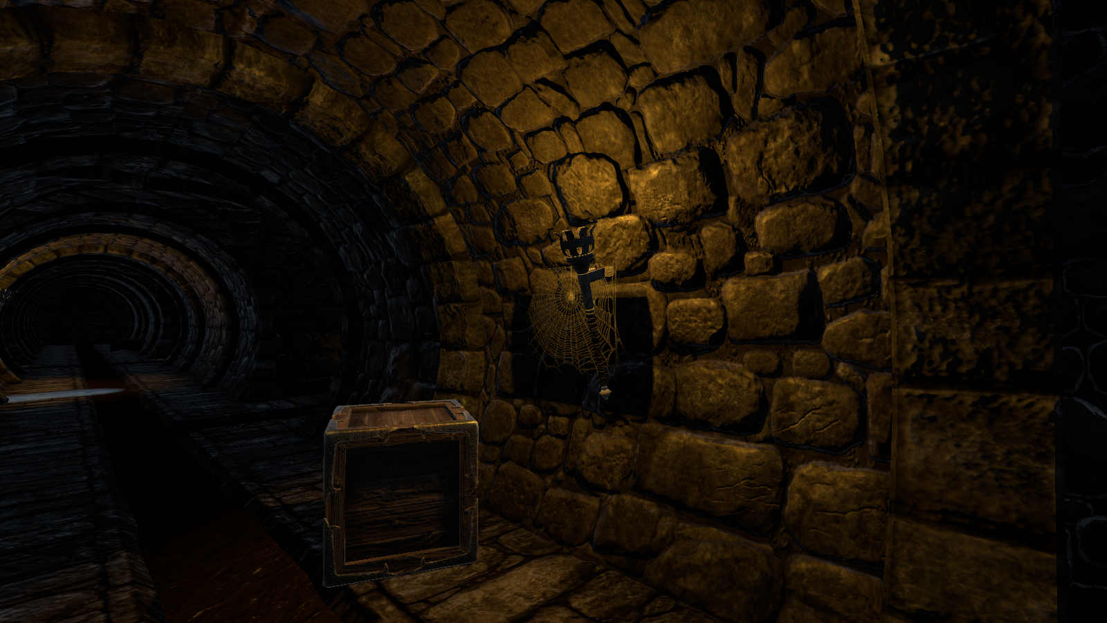 A cobweb seated flush against a curved sewer tunnel wall beside a lit torch, with a crate resting on the floor
