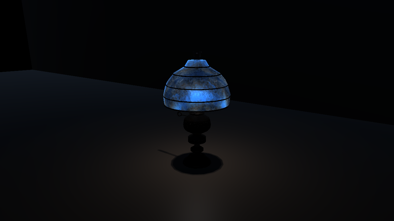 A table lamp with a glowing blue frosted glass shade casting a warm pool of light on a dark floor